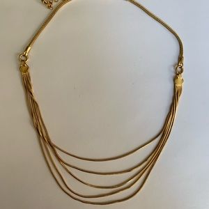 Gold multilayered necklace